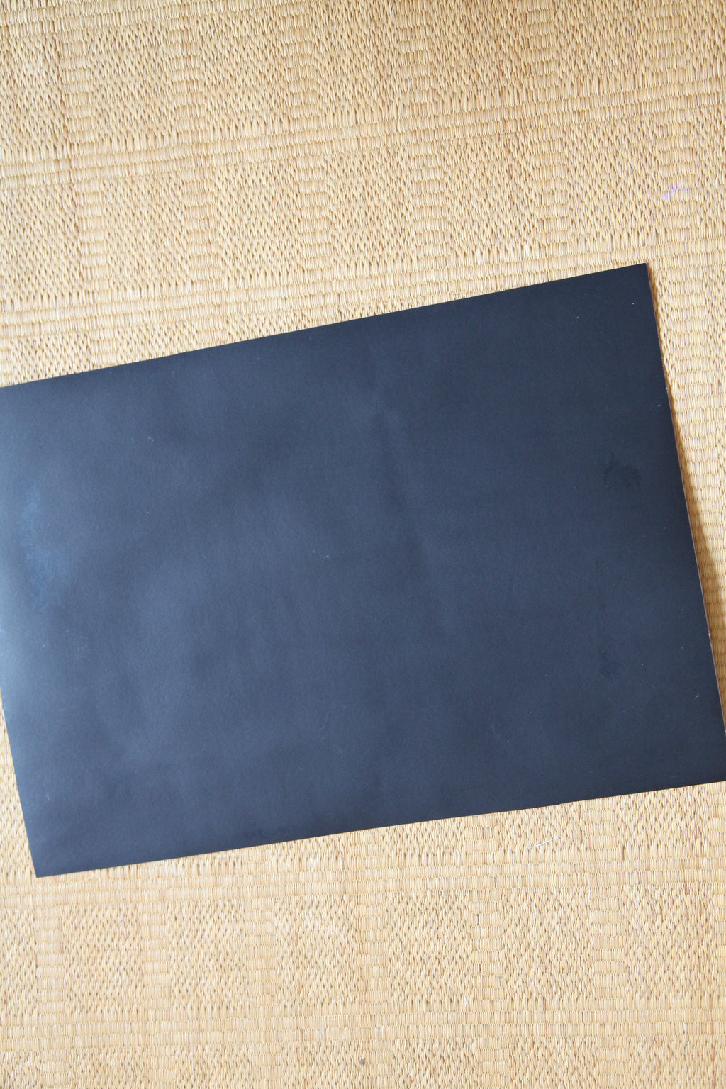 	Black backing board of mounted vintage manga art reproduction